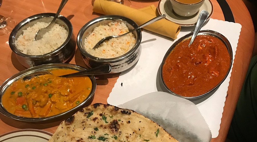 Red Fort Cuisine of India signature dishes Chicken Tikka Masala, Lamb Vindaloo, Saag Paneer, Garlic Naan